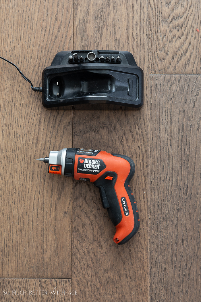 16 Essential Tools for Do-It-Yourself (DIY) Projects/electric screwdriver sitting beside its charger.