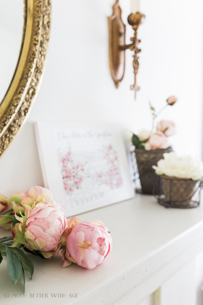 Pink peonies on the mantel.