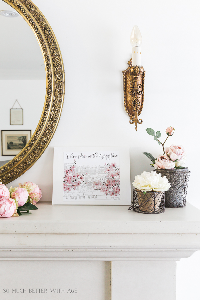 Cherry blossom art on the mantel.