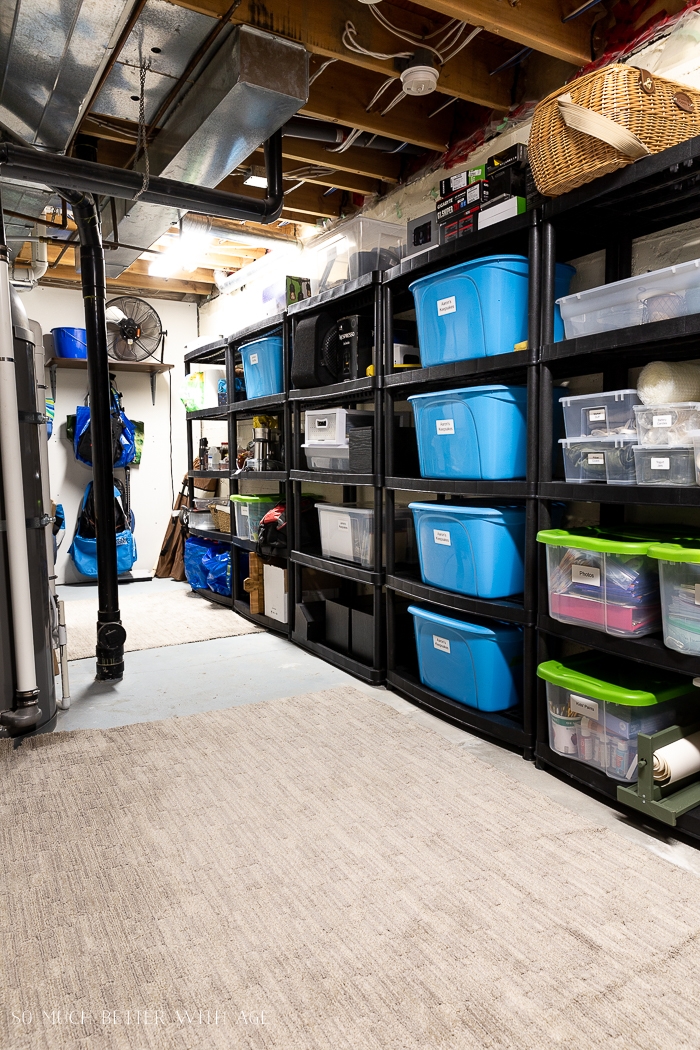 Basement storage shelves designed to perfectly fit 18-gallon bins.   Basement organization, Basement storage cabinets, Basement storage shelves