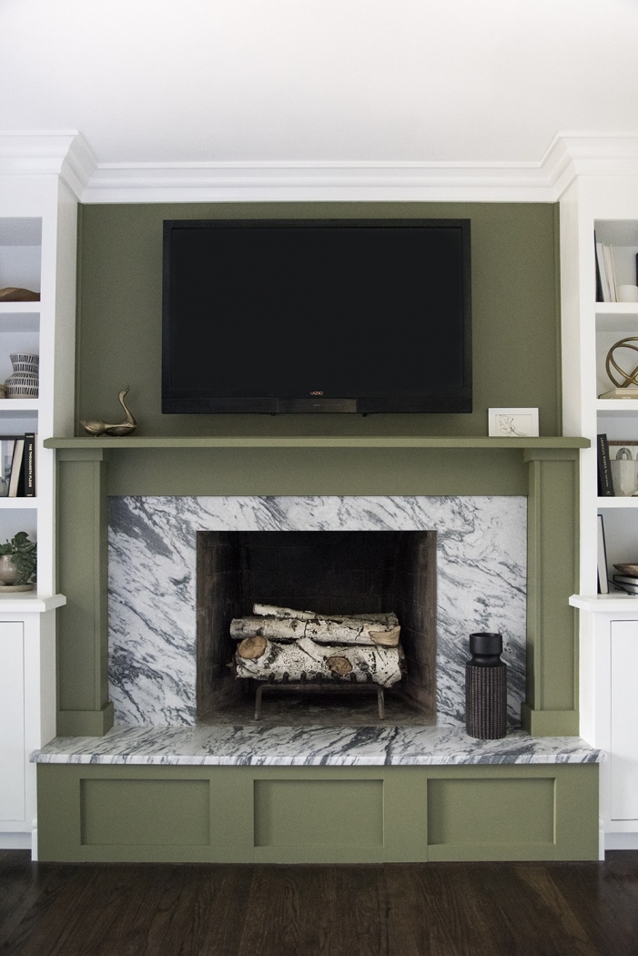 Room for Tuesday - green painted fireplace. Olive Grove by Sherwin Williams. 