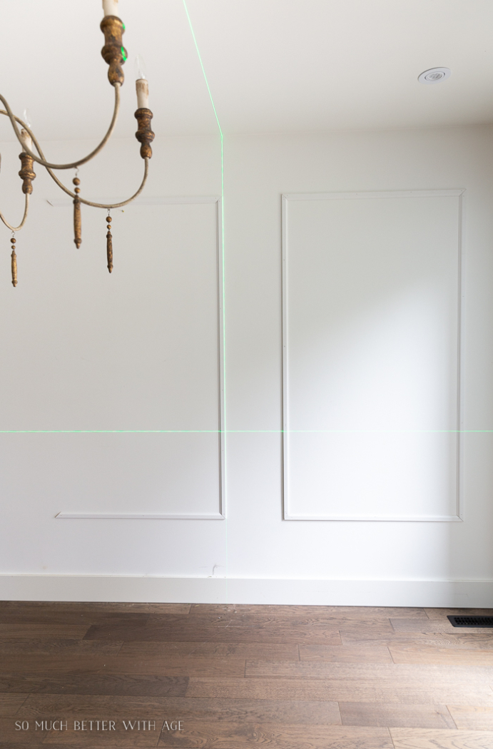 Moulding being installed in dining room.