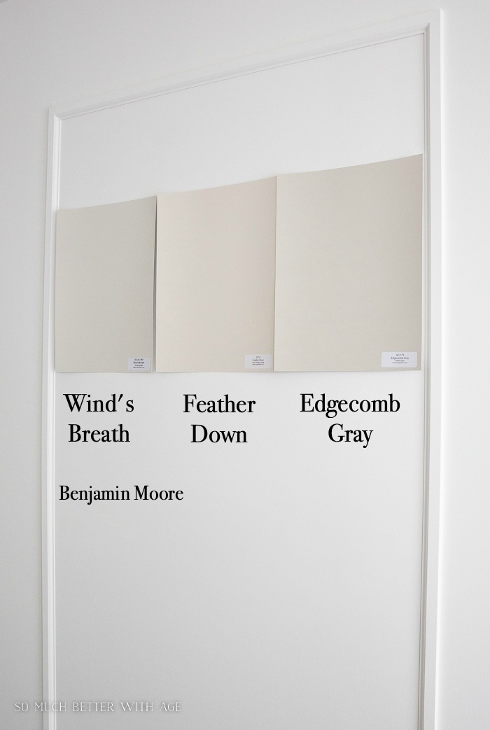 Benjamin Moore paint sample boards, Wind's Breath, Feather Down and Edgecomb Gray.