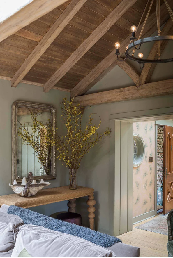 Blue and yellow clash color schemes shown in a living room designed by Reath Design. 