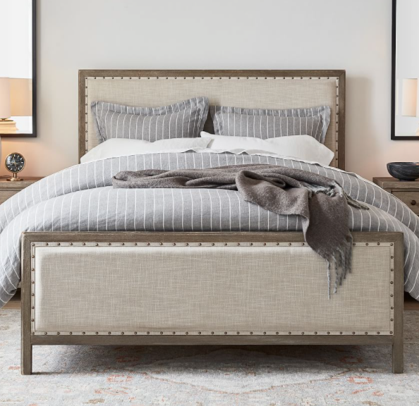 Toulouse wood and upholstered bed by Pottery Barn. 