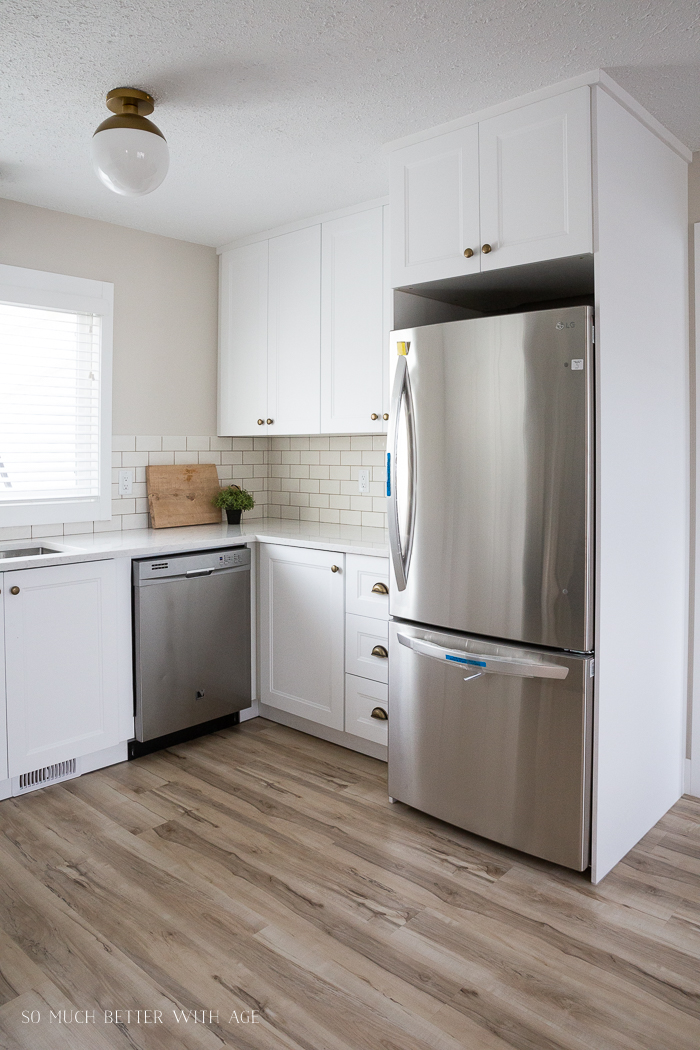Built-in fridge area with Ikea kitchen panels. 