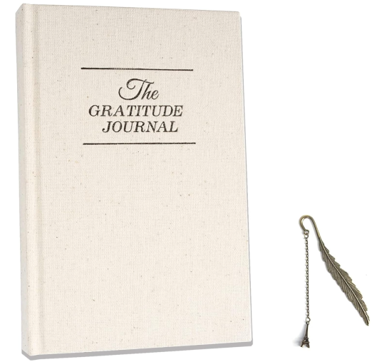 The Gratitude Journal in cream linen and a little Eiffel Tower bookmark. 