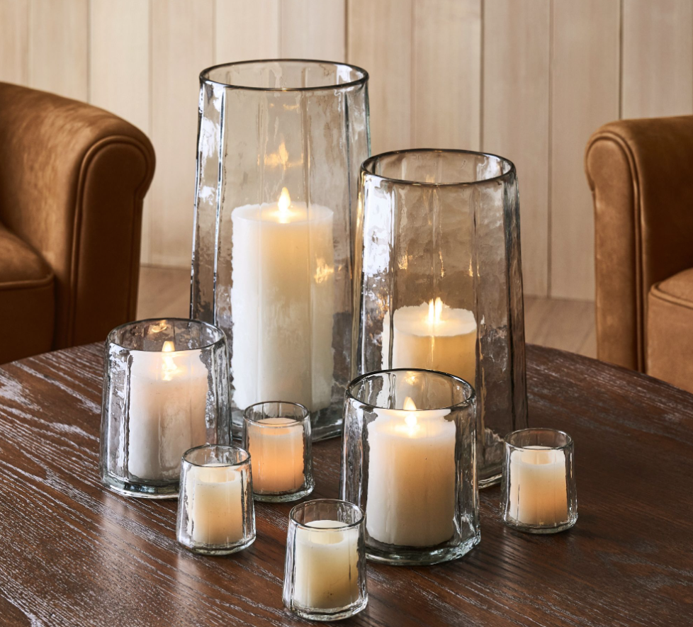 Hammered recycled glass hurricane candle holders.